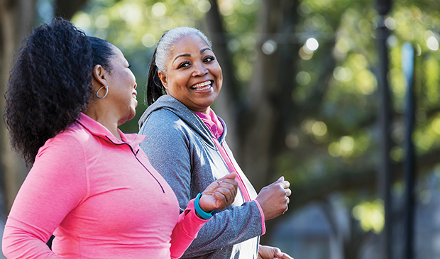 Women smiling while jogging
